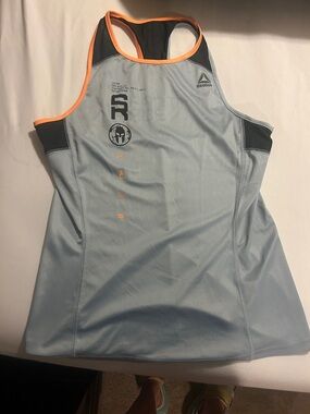 Reebok Spartan Race Light Blue Racerback Tank with Orange Trim Accents